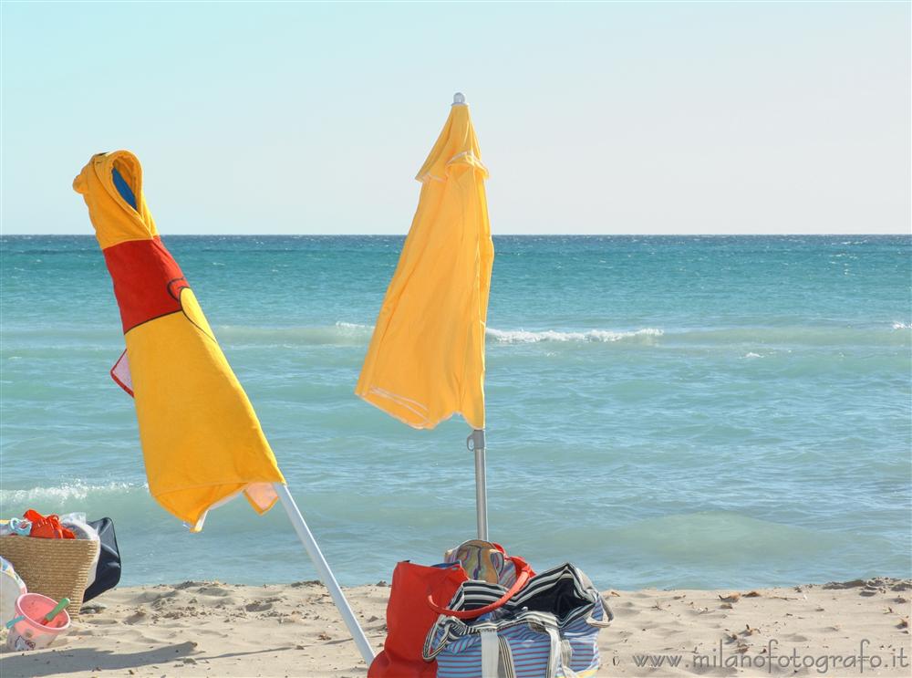 Torre San Giovanni (Lecce, Italy) - Sun umbrellas in front of the sea